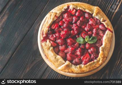 Strawberry galette decorated with fresh mint