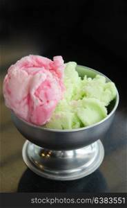 strawberry ice cream and green tea ice cream in bowl