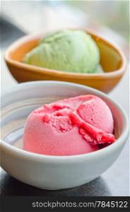 strawberry ice cream and green tea ice cream in bowl