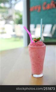 strawberry milk shake on wood background
