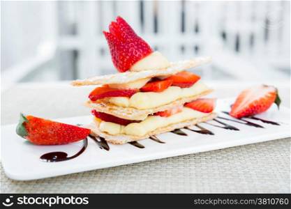 Strawberry Mille Feuille cake in white plate
