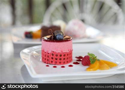 strawberry mousse cake with fruit