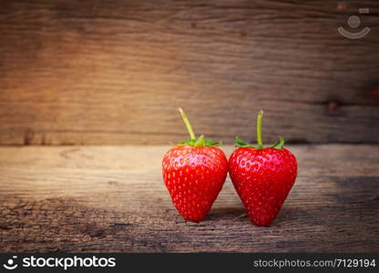 strawberry on a dark wood background