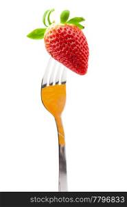 Strawberry on fork isolated on white