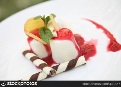 Strawberry Panna Cotta pudding with ice cream