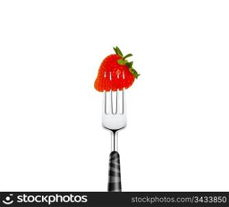 Strawberry pierced by fork, isolated on white background
