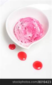 Strawberry pink ice cream ball in bowl on white background. Strawberry ice cream ball on white background