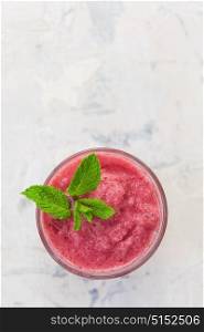Strawberry smoothie with mint. Strawberry smoothie with mint on a white concrete background