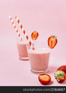 strawberry smoothies with pink background