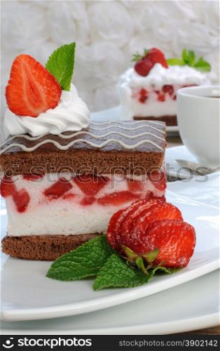 Strawberry souffle on a chocolate sponge cake