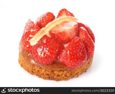 strawberry tart in front of white background