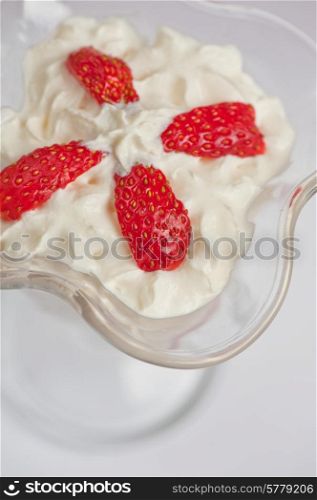 strawberry with cream closeup photo. strawberry with cream