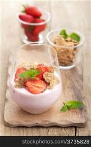 strawberry yogurt with cornflakes and mint