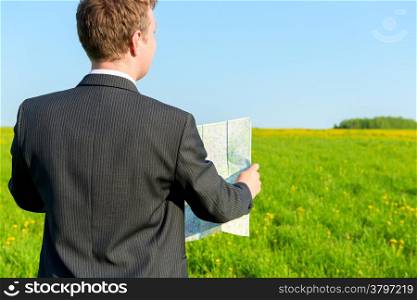 strayed man seeking to map the way in the field