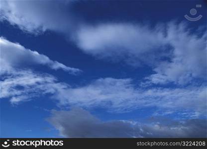 Streaking Clouds In A Blue Sky