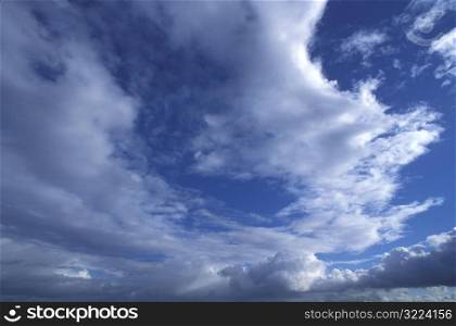 Streaks Of Clouds In A Light Blue Sky
