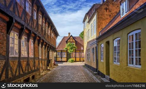 Street and houses in medieval Ribe town, Denmark. Street and houses in Ribe town, Denmark