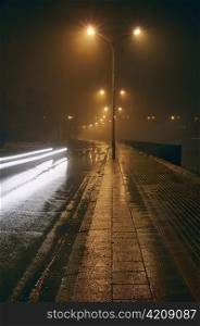 Street at night. Early spring. Light fog.