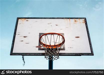 street basket hoop and blue sky