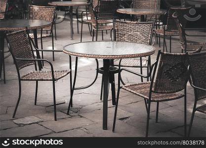 Street cafe tables and chairs in European city
