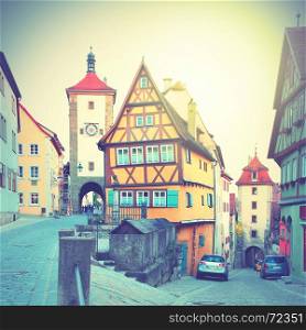Street in Rothenburg ob der Tauber, Germany. Retro style filtred image