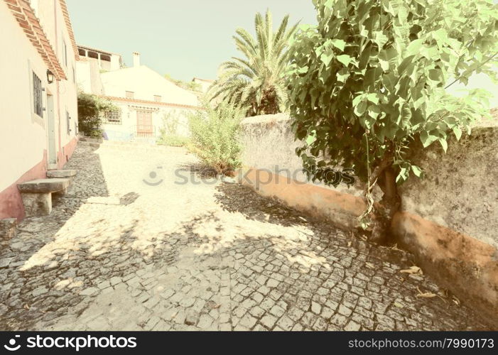 Street in the Medieval Portuguese City of Obidos, Retro Image Filtered Style