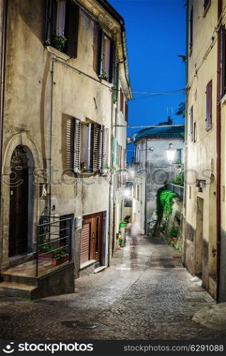 Street in the old town in Italy at night