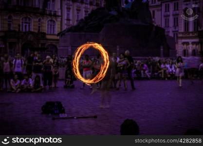 street juggler with torch