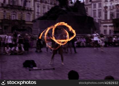 street juggler with torch