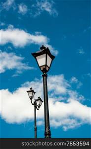 Street lamp blue sky and white clouds