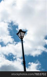 Street lamp blue sky and white clouds