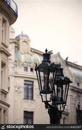 street lamps and beautiful buildings defocused at the background