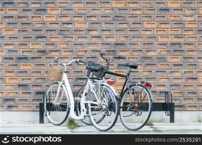 street parking bicycles against wall