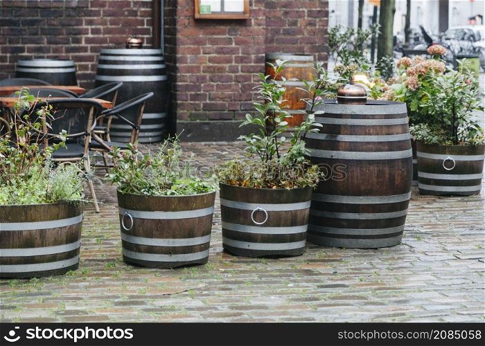 street plants wooden baskets barrels