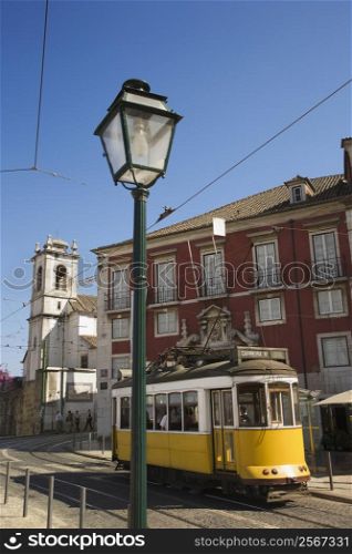 Street scene with trolley in Lisbon, Portugal.
