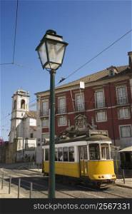 Street scene with trolley in Lisbon, Portugal.