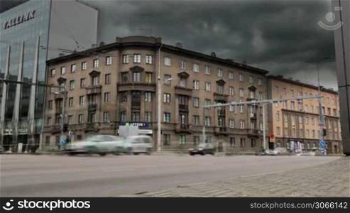 Street traffic timelapse in Tallinn, Estonia with dark clouds