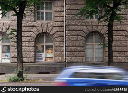 Street view of car driving past, Berlin