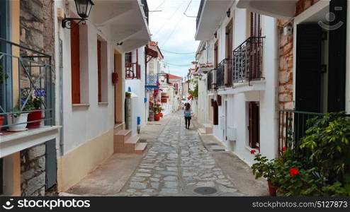 Street view of Skiathos town, Greece, traditional architecture, summer day