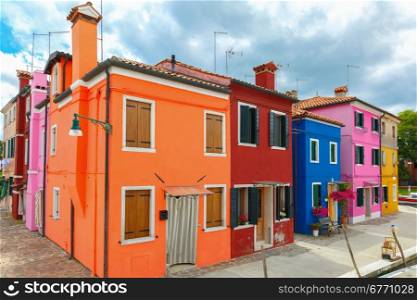 Street with colorful houses on the famous island Burano, Venice, Italy