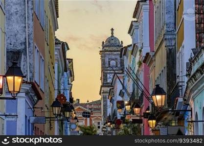 Street with historic houses with their facades and lanterns in the Pelourinho neighborhood in Salvador during sunset. Street with historic houses in the Pelourinho 