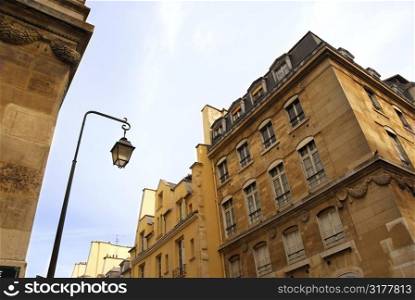 Street with old buildings in Paris, France