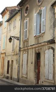 Street with old houses in Arles, Provence