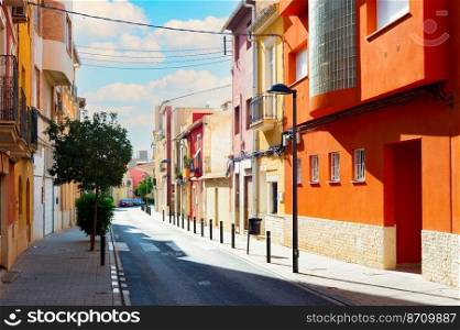 Street with traditional architecture of Mediterranean region, Alicante, Spain
