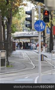 Street with tramway rails, pedestrian and bicycle paths