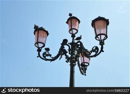 streetlamp from below on sky background