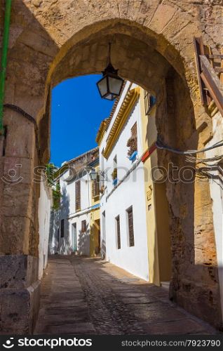 Streets decorated with bows and barred windows typical of the city of Cordoba, Spain