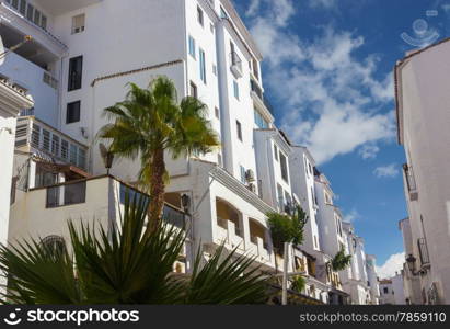 streets with whitewashed buildings typical of Puerto Banus, Malaga Spain