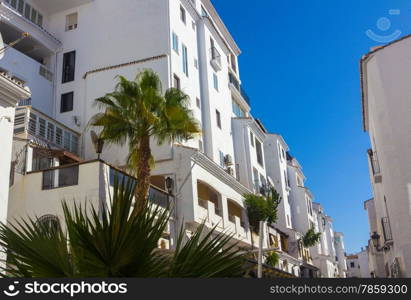 streets with whitewashed buildings typical of Puerto Banus, Malaga Spain