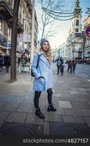 Streetstyle photo shoot of beautiful fashion blonde woman